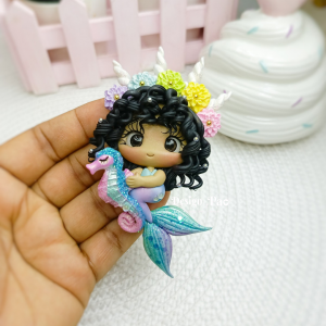 Sirena con caballito de mar
